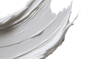 Close-up of a grey substance being poured from a tube