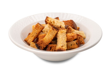 Crunchy croutons bread in white bowl isolated