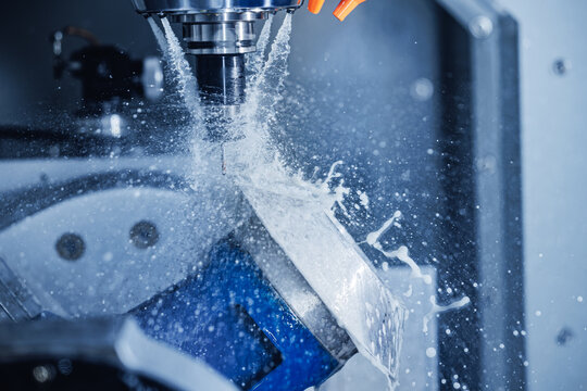 Five axis CNC machining center cutting engine turbine. Concept modern technology for industry