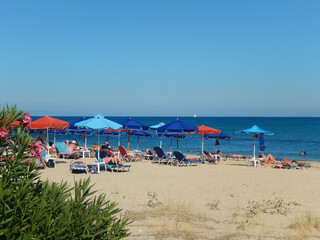 Beach, sun, sand and people