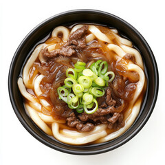 A bowl of udon noodles served in French onion-style beef broth with caramelized onions and melted Gruyere cheese e East meets West.
