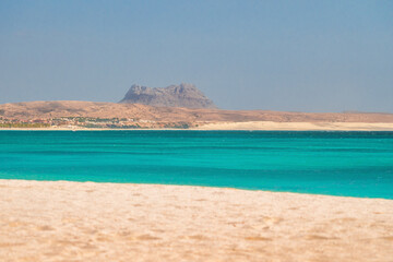 Beautiful tropical beach on Boa Vista Island, Cape Verde, featuring golden sand, clear turquoise...
