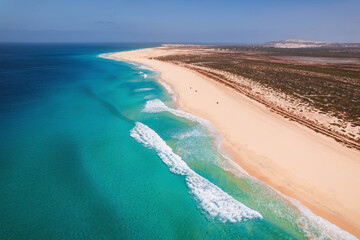 Beautiful tropical beach on Boa Vista Island, Cape Verde, featuring golden sand, clear turquoise...