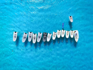 Drone view of a motorboats. Luxury transportation. Vacationing people. Azure water. Vacation and holidays. Summer time for sea travel.  Background, wallpaper, postcard.