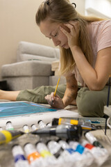 Female Artist Painting at Home