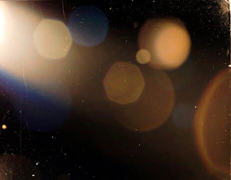 Vintage lens flare on dark background