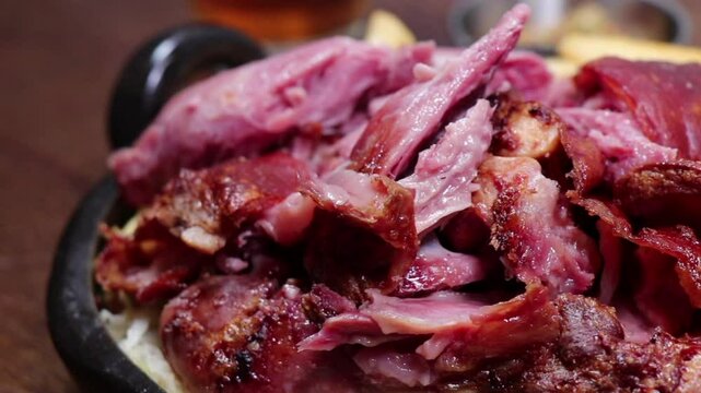 Glass of beer and a plate of schweinshaxe