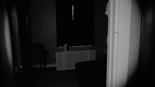 A stylized film look view of a zombie charging down a hallway, reaching for the camera with glowing eyes and a twisted grin. Intense POV horror chase scene inside a dark home.  	