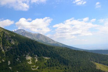 Views from the trekking route. Mountain hiking trail leading from Chata pod Soliskiem to Predne...