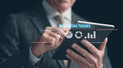 Businessman searching marketing trends for business planning target.
