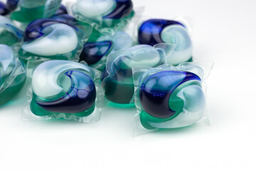 Laundry detergent pods for washing machine on white background