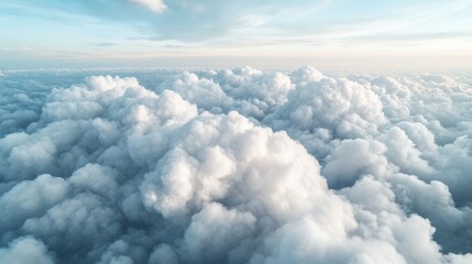 A stunning aerial view of soft, fluffy clouds in a vibrant blue sky, inviting feelings of freedom, peace, and tranquility while illustrating the beauty of nature's canvas.