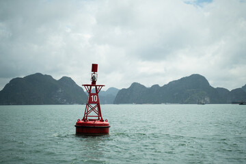 A buoy floats on the ocean, sending a maritime warning to ensure safety at sea, guiding navigation through the water for every vessel in the vast marine world.