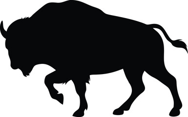 Powerful black bison silhouette in a charging pose ready for action depicted with great artistic flair