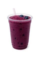 Delicious berry smoothie served in a clear cup with straw and blueberries on top