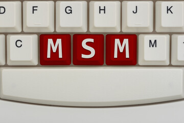 MSM mainstream media concept with close-up of white computer keyboard