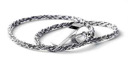 Fototapeta premium Shiny silver whistle with black and white patterned lanyard on a white background
