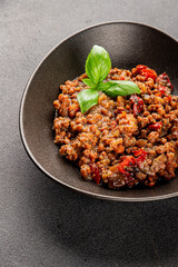 Lentil dish vegetables and roasted peppers savory vegetable fresh vegetarian and vegan food gourmet food background on the table rustic food top view copy space keto and paleo diet
