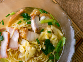 egg noodles with wonton roasted pork and crispy pork.