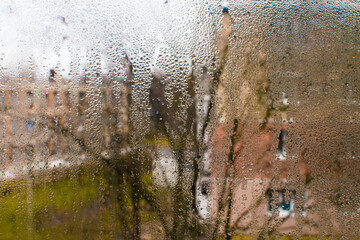 Water Droplets on Wet Glass, Creating a Calming and Atmospheric Mood