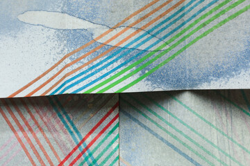 Colorful stripes on white paper, grunge background
