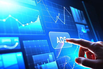 Digital advertising concept with data visualization graphs and a hand pressing the ads button representing online marketing strategies.