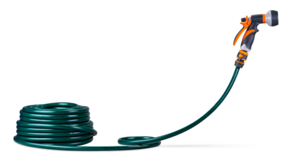 A flexible green garden hose coil elegantly beside a sturdy orange spray shower nozzle isolated owhite background
