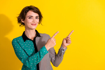 Photo of nice stunning lovely girl wear stylish dotted print clothes recommend empty space isolated...