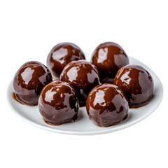 Delicious round chocolate coated balls arranged on white plate, tempting and indulgent treats for chocolate lovers