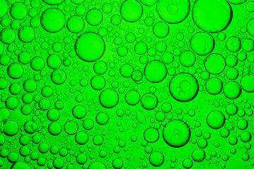 Close-up macro bubbles of green drink,Closeup of bubbly green soda with refreshing carbonation