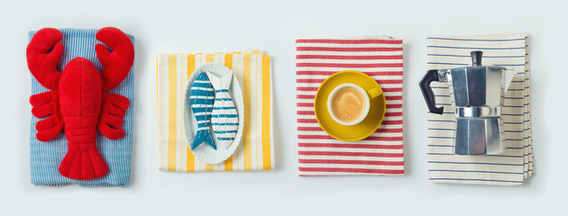 Mediterranean trendy summer concept with coffee cup, coffee pot, lobster and fish on striped towels isolated on white background. Top view, flat lay