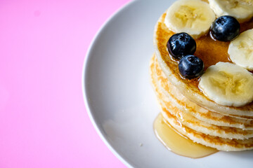 Fresh Pancakes With Sliced Banana Blueberries And Honey