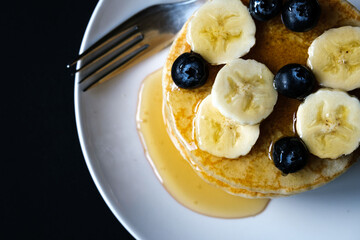 Fresh Pancakes With Sliced Banana Blueberries And Honey