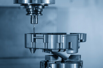 The aluminum gear case parts tapping process on CNC milling machine with tapping holder in the...