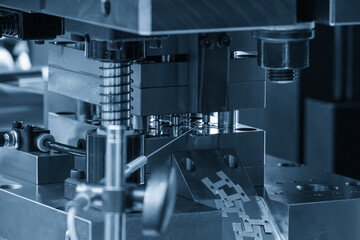 The electrical parts mass production by progressive die in the light blue scene.