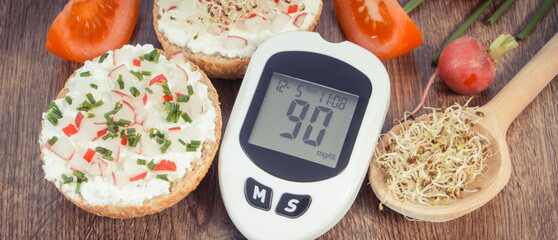 Glucometer with sugar level and freshly breakfast. Healthy nutrition during diabetes