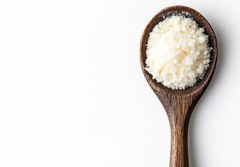 Fine, pale cheese powder in a wooden spoon