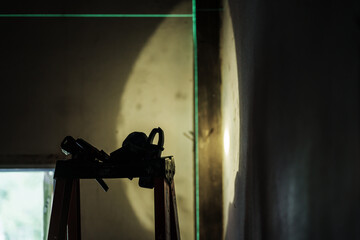 Construction progress indoor site photo dim lighting close-up tools and environment interaction