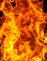 Fototapeta premium Flames of fire close view background