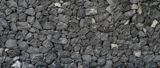 Panoramic texture of natural volcanic stone wall from Tenerife Island, Spain