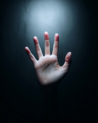 Open human hand fingers spread palm visible isolated hand dark background soft lighting skin texture gesture reaching out single hand
