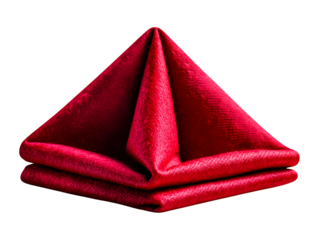 Crisp red paper napkin, folded into triangle, sharp creases visible,