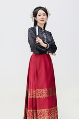 Chinese woman wearing Chinese Ming Dynasty Hanfu on black background