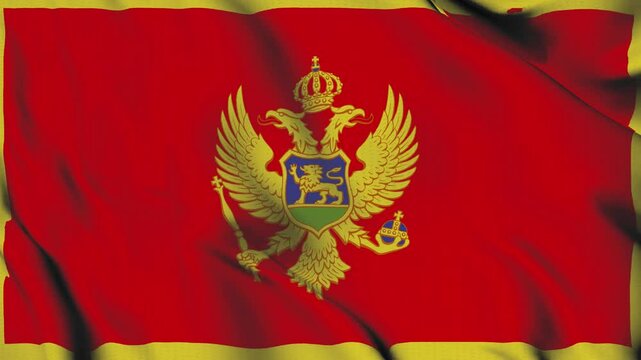 The Montenegro country flag waves in the wind.