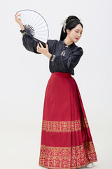 Chinese woman wearing Chinese Ming Dynasty Hanfu on black background