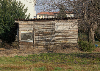 an old wooden storage shed in the garden