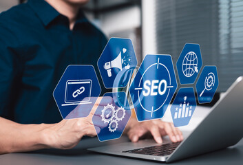SEO Search Engine Optimization Strategy Concept. Businessman using laptop with SEO-related icons such as link building, analytics, global web targeting to boost online visibility, digital marketing,