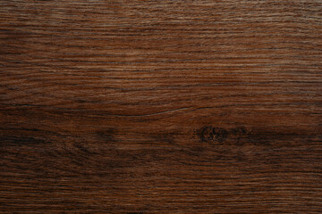 Close-up of vertical wood  texture with rich warm brown tone and deep lines