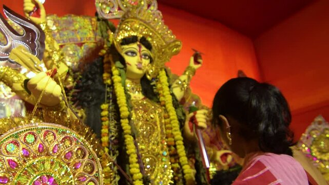 Young Bengali Woman Performing Baron Ritual Before Idol Immersion (Bhashan) &ndash; Traditional Cultural Ceremony