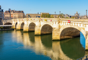 Pont Neuf - oldest bridge over Seine river in Paris, France